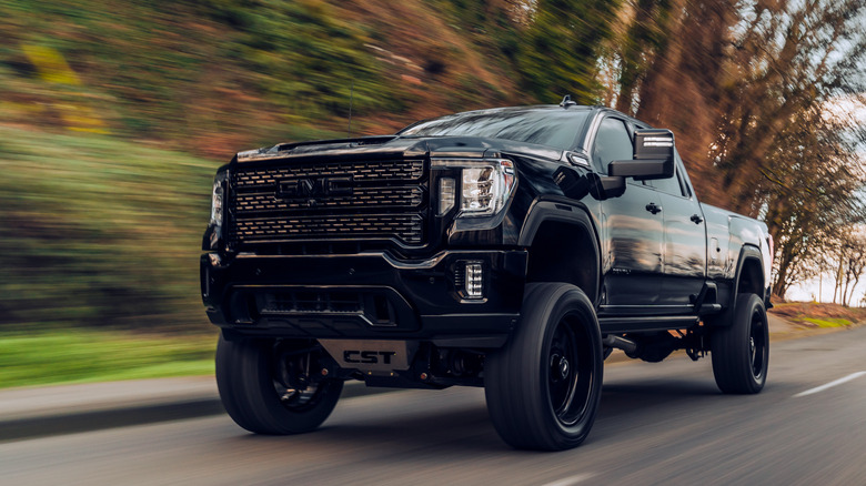 A Duramax Diesel GMC truck on the highway.