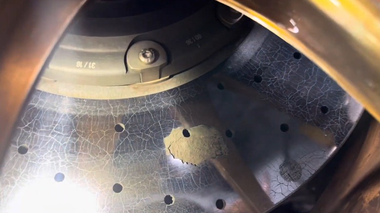 A carbon ceramic brake rotor with a large chip