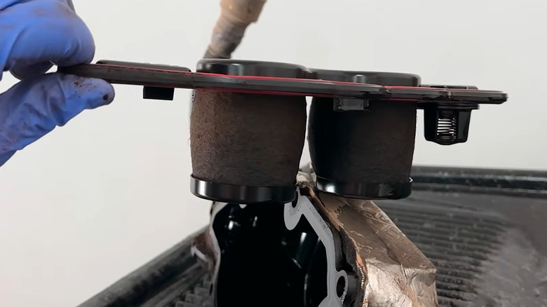 Internals of a Ford 6.7L PowerStroke CCV box, showing swollen filters