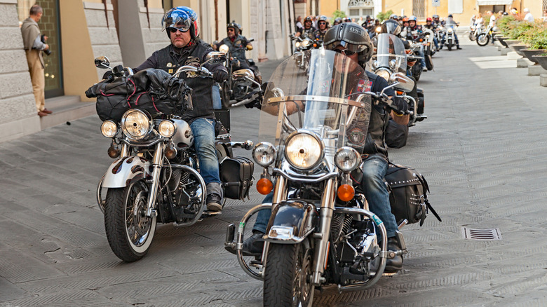 A group of Harley riders on the street