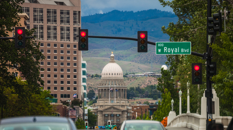 Several red traffic lights, mounted vertically.