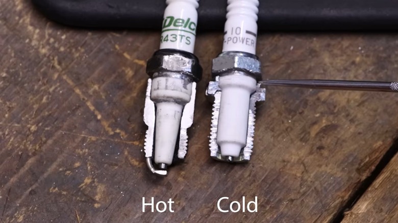 Cross-cut view of hot and cold spark plugs