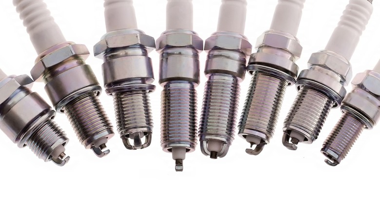Various types of spark plugs with different tip shapes