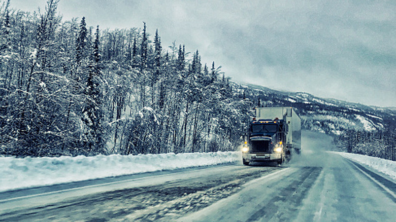 A big rig driving in winter conditions