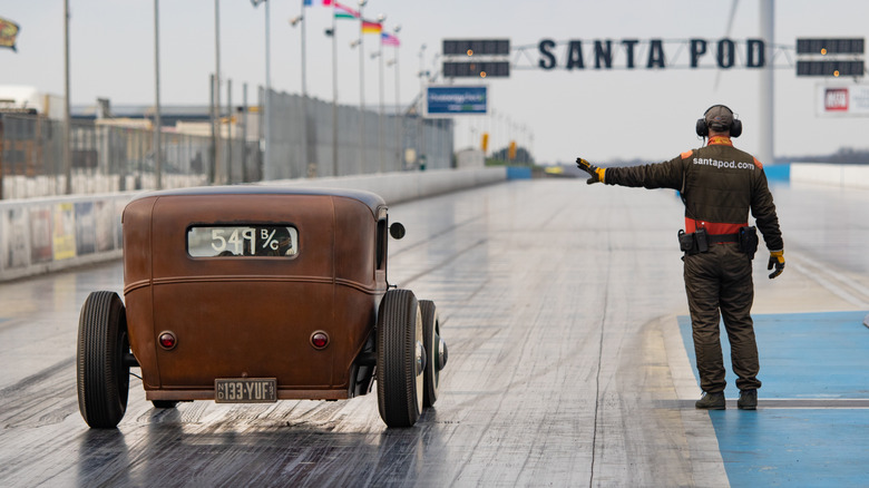 A vintage dragster astatine Santa Pod Raceway, Europe's first imperishable resistance racing facility