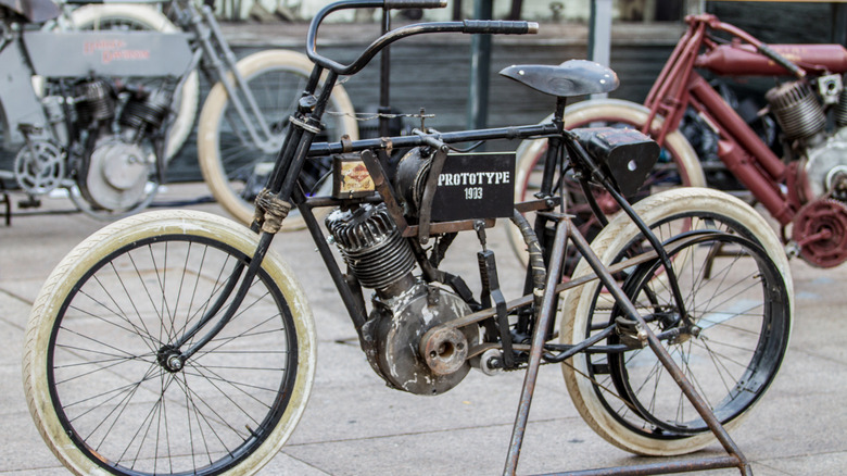 An early Harley-Davidson prototype with other bikes in the background