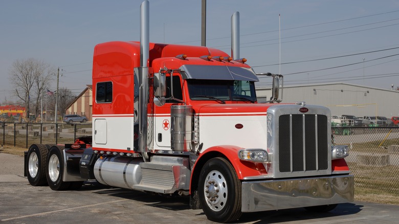 Red and white Peterbilt semi trailer