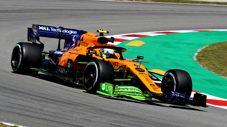 McLaren F1 car during free practice, Barcelona 2022. Showing green flow-vis paint on the right side of the front wing.