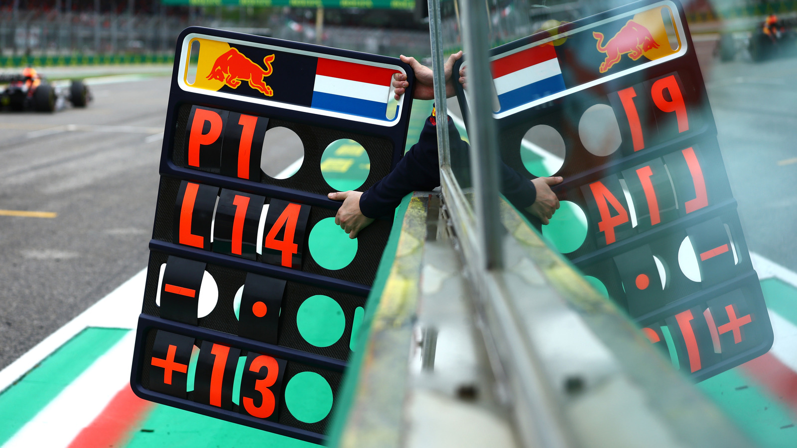 Why F1 Teams Still Use Old-School Pit Boards, And What They Actually Show