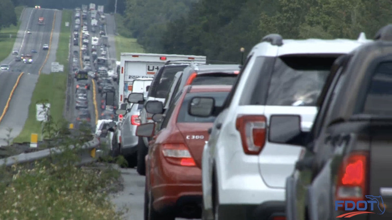 Traffic line along a long highway