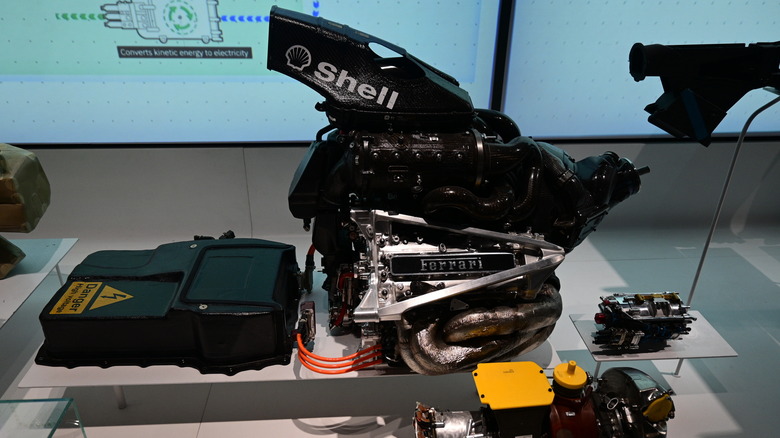 A Ferrari Tipo 065-6 engine with Mercedes-AMG F1 W10 EQ Power+ MGU-K unit on display at a Formula 1 exhibit in London