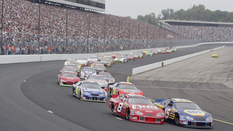 A NASCAR race at Darlington in 2003, with the stands packed with fans