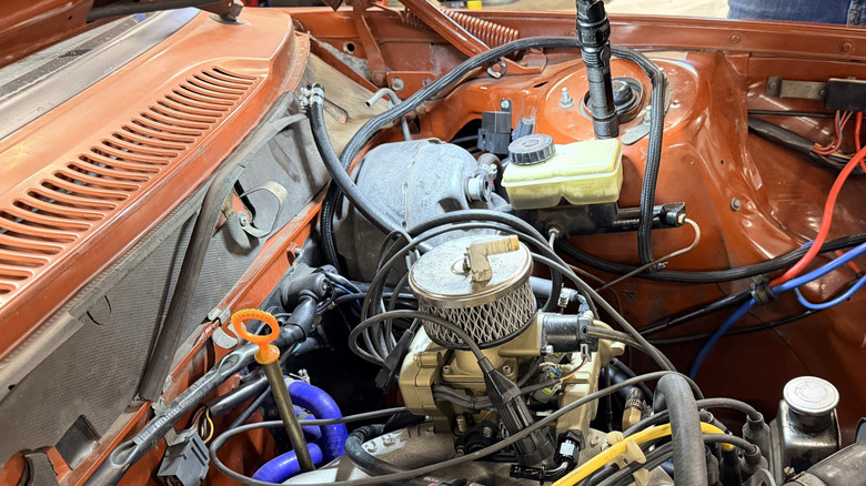 The Holley Sniper EFI 1100 under the hood of a Volvo 245