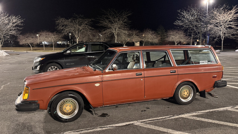 A 1979 Volvo 245 DL parked in outside.