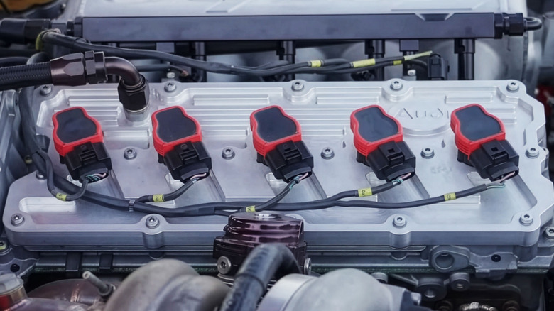 A closeup of an Audi Quattro turbocharged five-cylinder engine cylinder head.