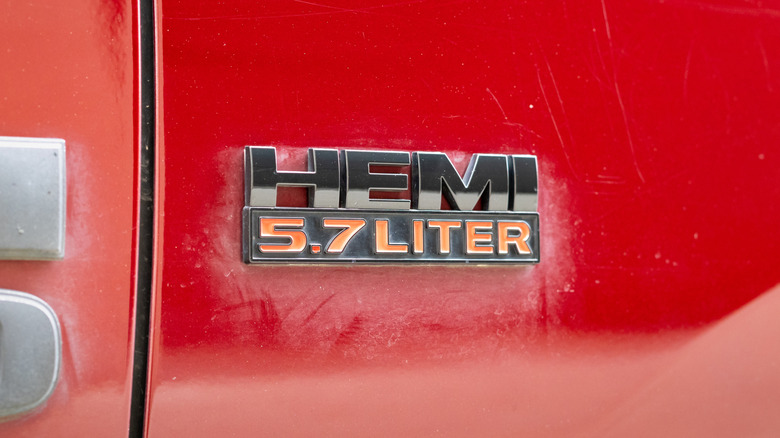 A car emblem showing hemi 5.7 L motor displacement