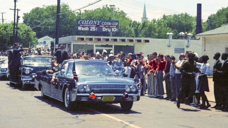 Vintage Nikon film scan of a photograph of President John F. Kennedy arriving for a campaign visit to Nashville's Vanderbilt University's Dudley Field