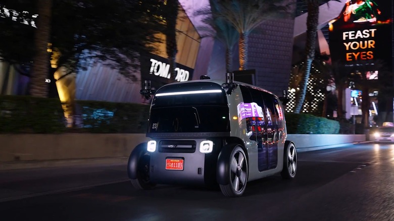 A Zoox driverless robotaxi on the Vegas strip navigating Botts' dots