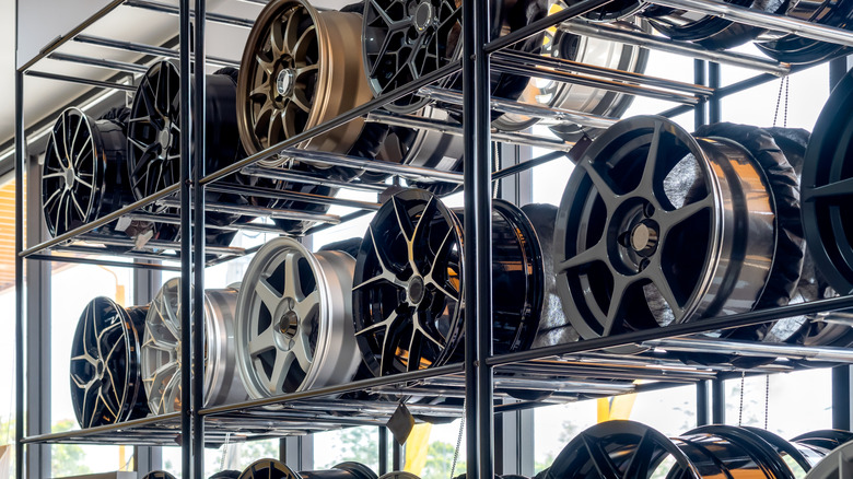 Selection of alloy and magnesium wheels on display in an auto parts store