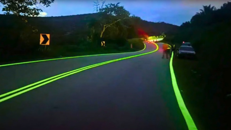 A wide view of a Malaysian road with glow-in-the-dark paint