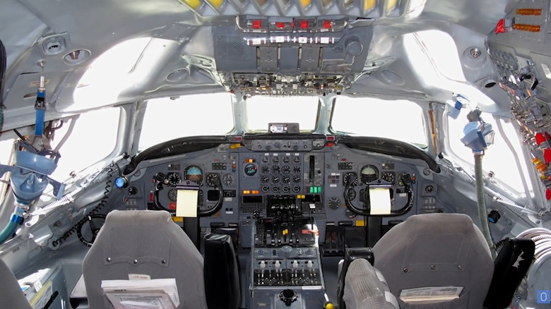 An interior view of the cockpit with eyebrow windows