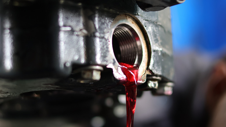 Transmission fluid flowing out of the transmission oil pan