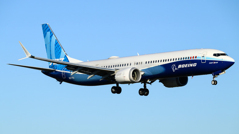 A Boeing 737 MAX 10 experimental aircraft flying in company colors, registration N27751