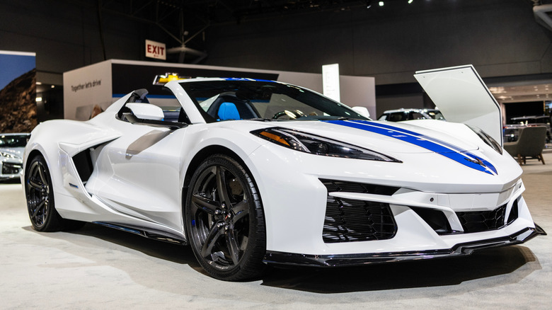 White Chevrolet Corvette E-Ray at an auto show