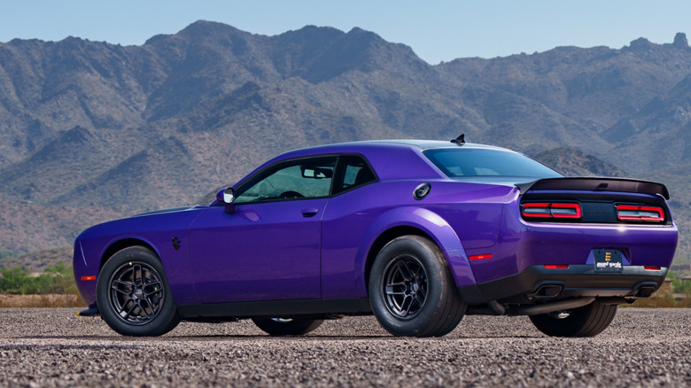 Rear three-quarter view of a purple Dodge Demon 170