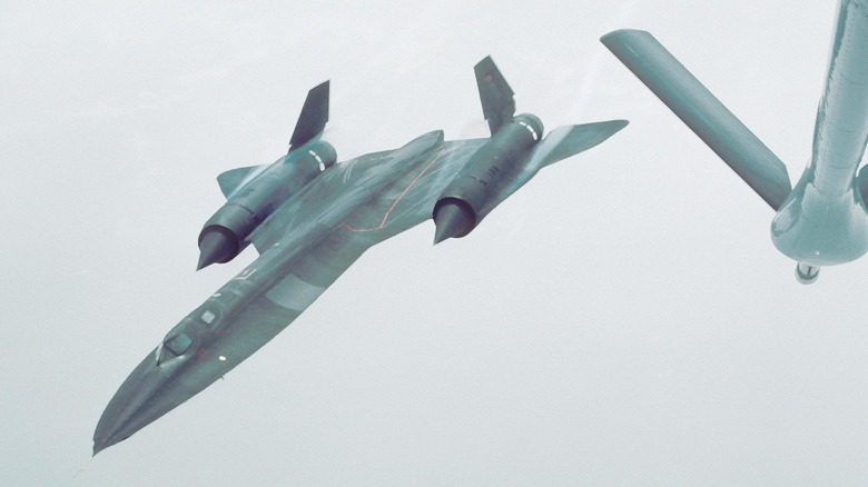 An SR-71 flying away from a fueling aircraft