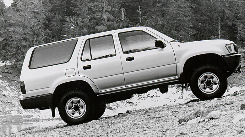 A 1990 Toyota 4Runner climbing up a hill.