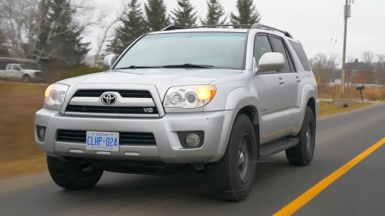 A fourth-generation V8 Toyota 4Runner driving on the road