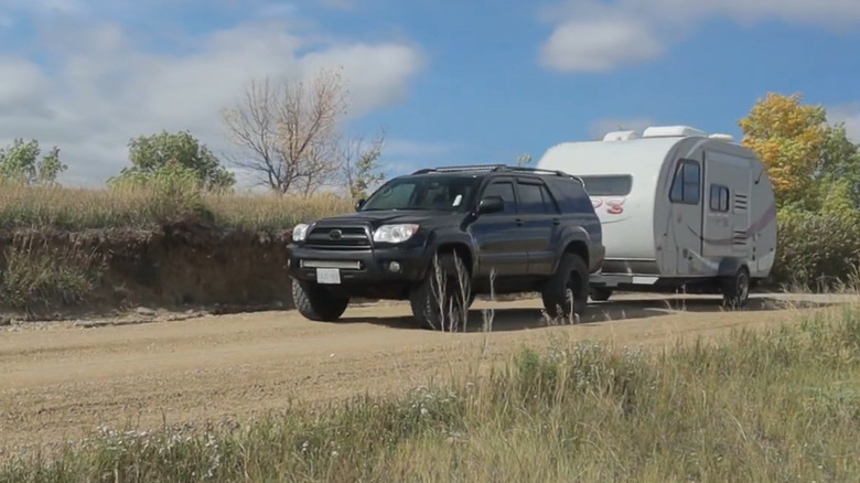 A fourth-generation V* Toyota 4Runner towing a camper