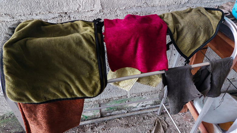 Freshly-washed microfiber towels on a drying rack