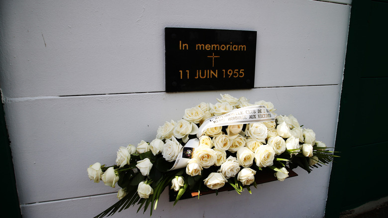 Flowers laid at a memorial for the victims of the 1955 disaster during the 100th anniversary of the 24 Hours of Le Mans at the Circuit de la Sarthe June 10, 2023 in Le Mans, France.