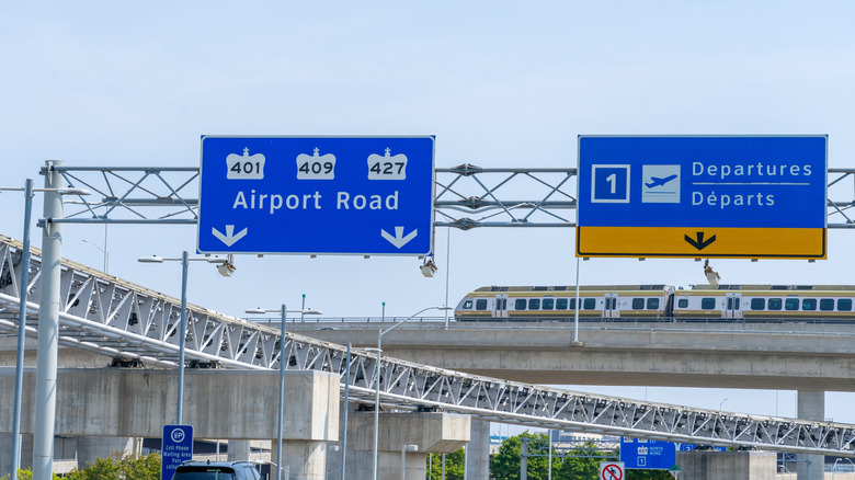 A road sign near Pearson International Airport pointing to Airport Road.