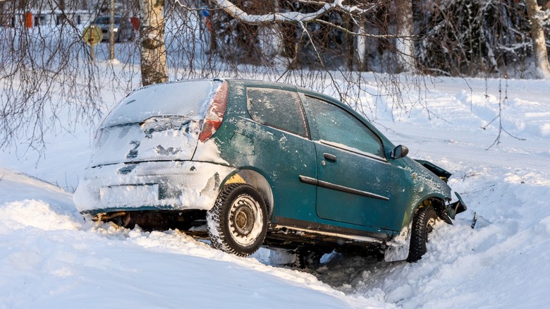 Car wrecked in a ditch during winter