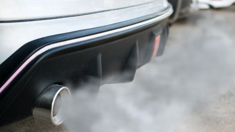 Exhaust fumes coming out of the rear of a car
