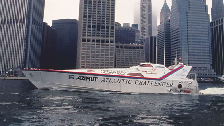 A side view of the Azimut Atlantic Challenger on the water