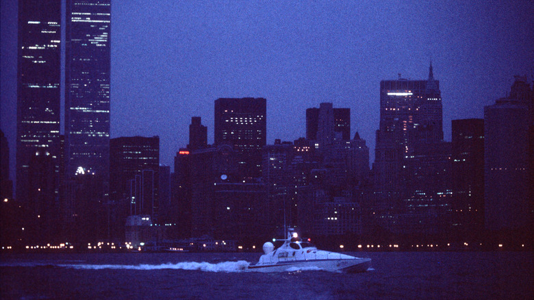 An image from 1991s of Jet Ruban Bleu moving through the water one evening alongside New York City.