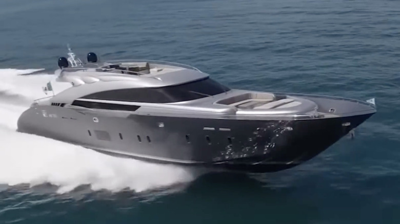 An Italian Kereon moving at high speeds out on the ocean a good distance from the shore.