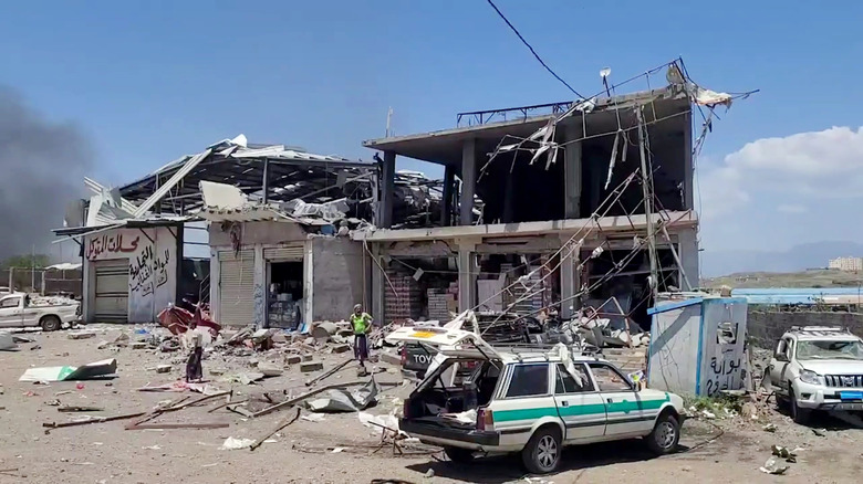 In this handout photo provided by Houthi Media Center, merchants inspect their shops at a market that was targeted by an aerial attack carried out by a Saudi war jet on September 27, 2026 in Taiz province, Yemen.