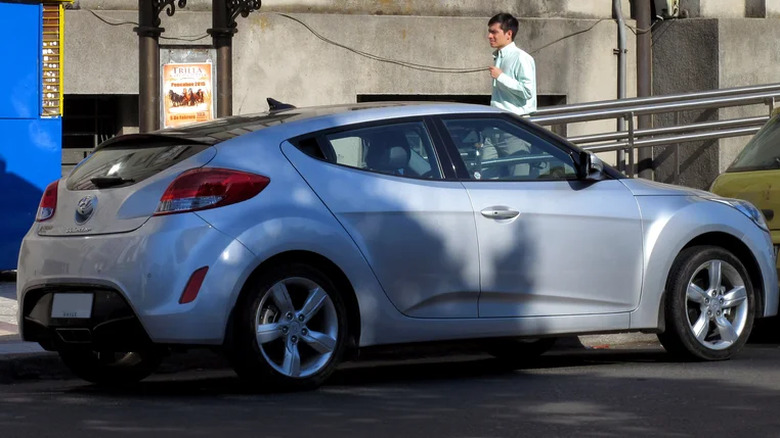 A silver 2015 Hyundai Veloster