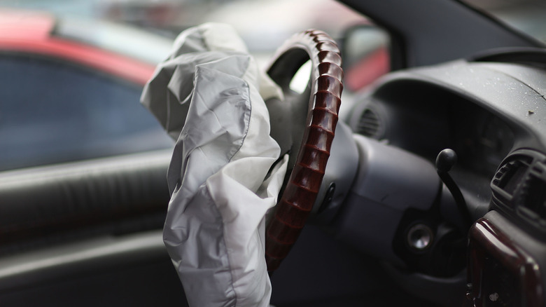 A deployed airbag is seen in a Chrysler vehicle at the LKQ Pick Your Part salvage yard on May 22, 2015 in Medley, Florida.