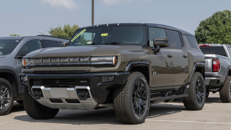 A brown Hummer EV SUV