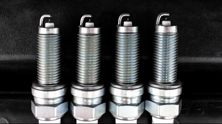 Four new genuine iridium spark plugs