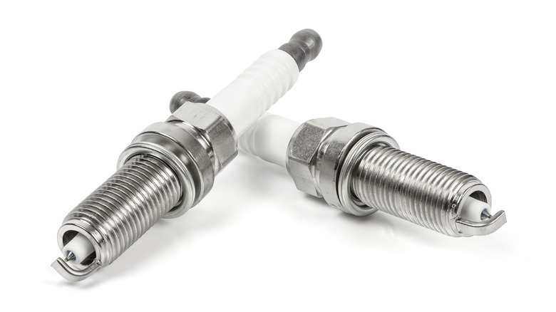 Two spark plugs isolated on white background.