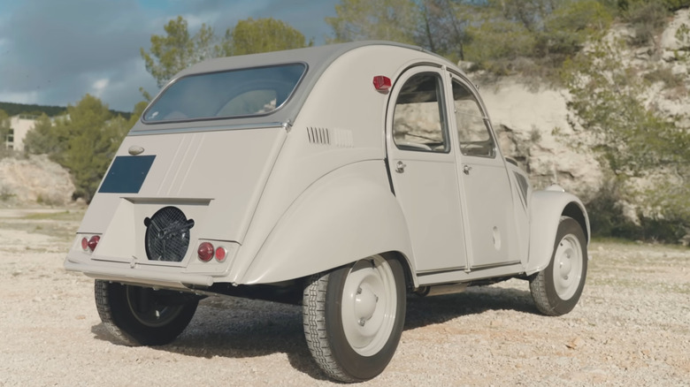 A rear-quarter shot of a 2CV Sahara