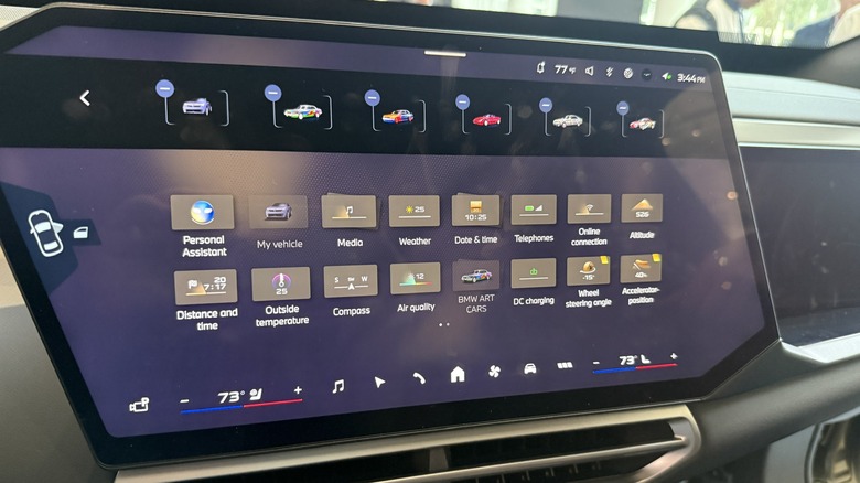 2027 BMW iX5 with Art Cars displayed on the Panoramic Vision display
