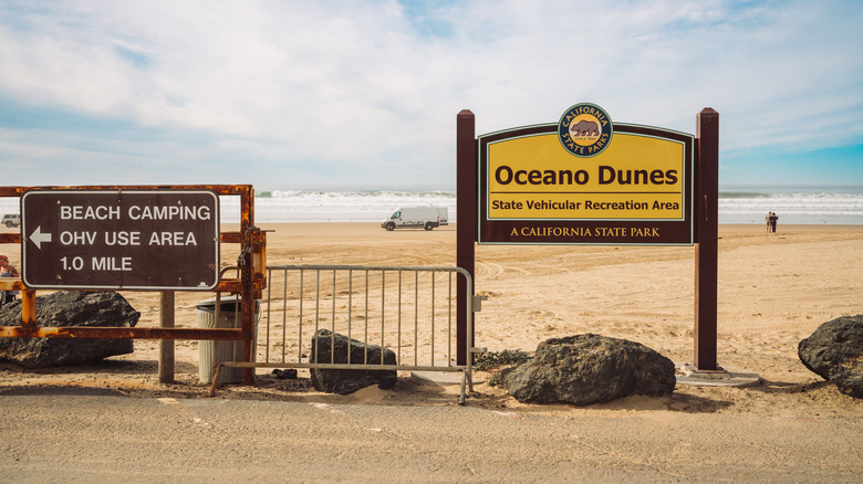 Oceano, California, USA - January 12, 2022. Oceano Dunes State Vehicular Recreation Area, a California State Park sign. Beach access